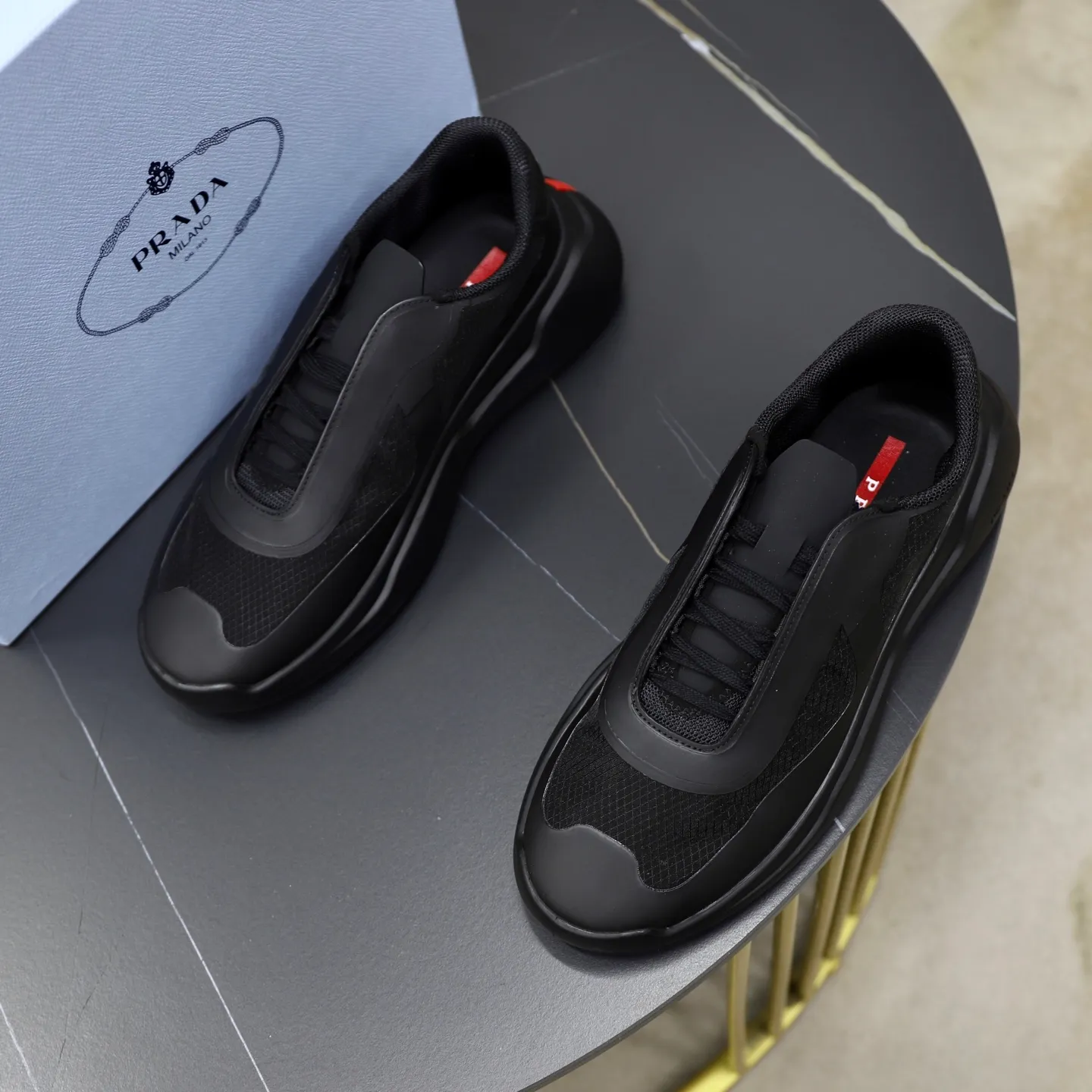 Men's Shoes 💰760💰 PRADA America's Cup Recycled Nylon and Bike Fabric Sneakers Practical and innovative, these regenerated nylon sneakers are modern, with lightweight soles and minimalist details. The upper is decorated with temperature-locking adhesive tape, screen-printed ADA logo, nylon loop shoelaces, T sole, made of ultra-light foam rubber filling material, rubber pattern texture, sole height: 40 mm, removable fabric-covered insole, Size 39-44